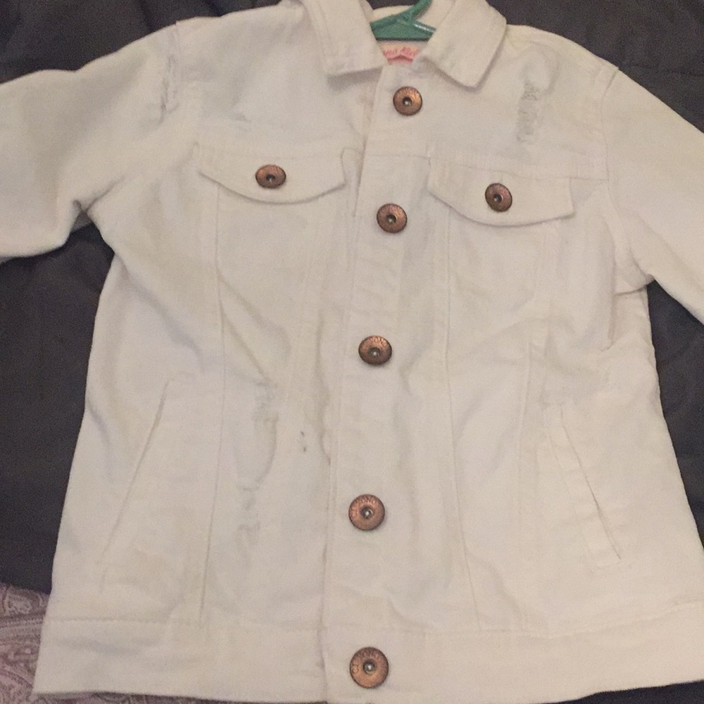White ripped denim jacket